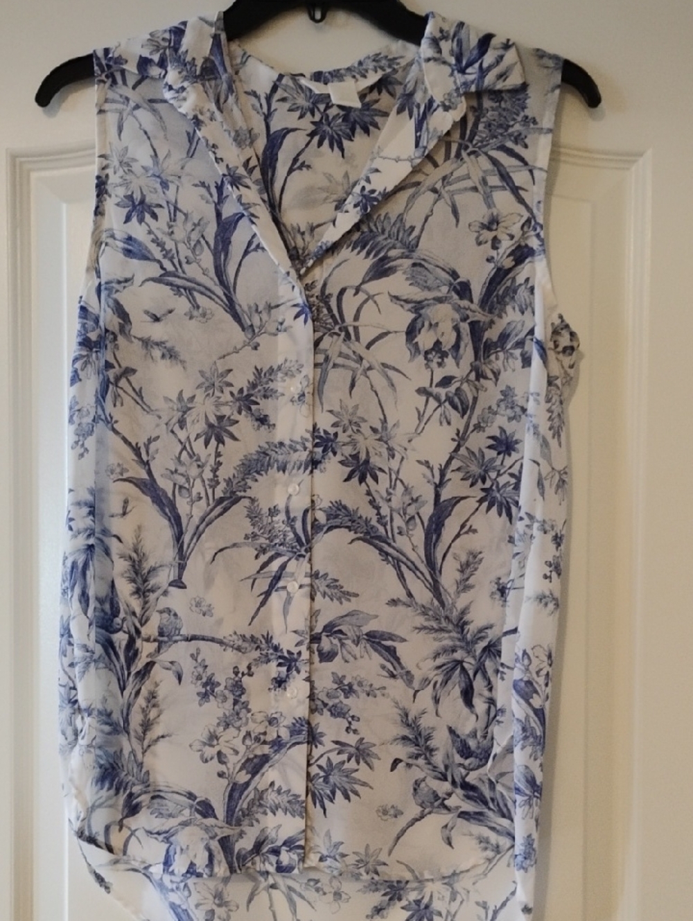 H&M White Sleeveless Button-Front Blouse with Blue Floral Print